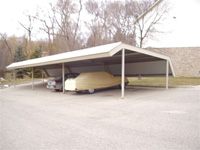 Small four vehicle carport with angled roof